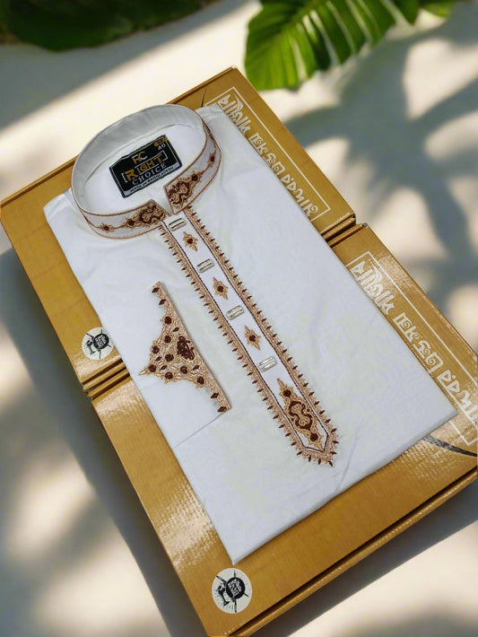 White embroidered shirt with a matching cap on a branded box against a light gray background